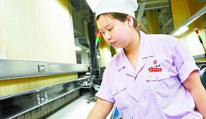 20岁前凭接线头脱颖而出,如今她成为“纺织女状元” 20岁前凭接线头脱颖而出,如今她成为“纺织女状元”
